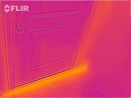 Thermal image of heat Loss under the garage door.